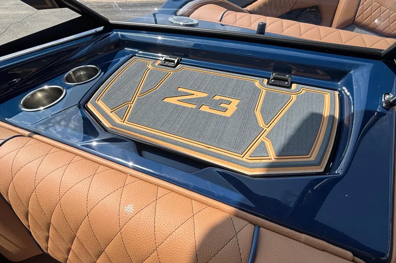 Slide: The Image of 2026 Tigé Z3 boat interior with luxury seating and cup holders. - 40