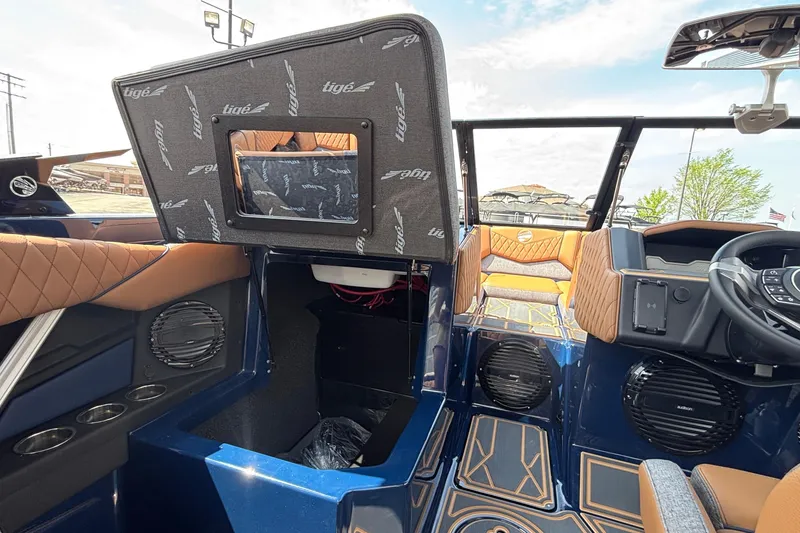 Slide: The Image of 2026 Tigé Z3 boat interior with luxurious seating, advanced dashboard, and stylish design elements. - 42