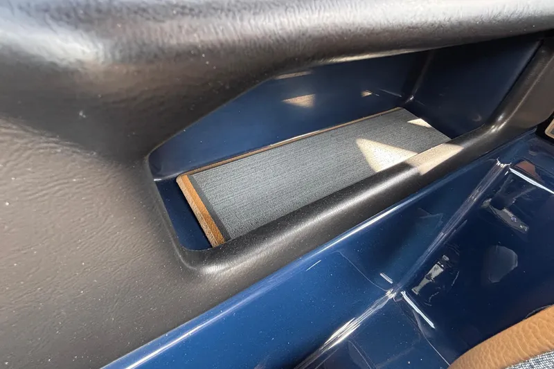 Slide: The Image of Interior detail of 2026 Tigé Z3 boat, featuring sleek blue and black design elements. - 51