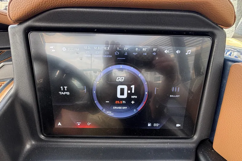Slide: The Image of 2026 Tigé Z3 dashboard display showing speed, ballast, and system indicators. - 55