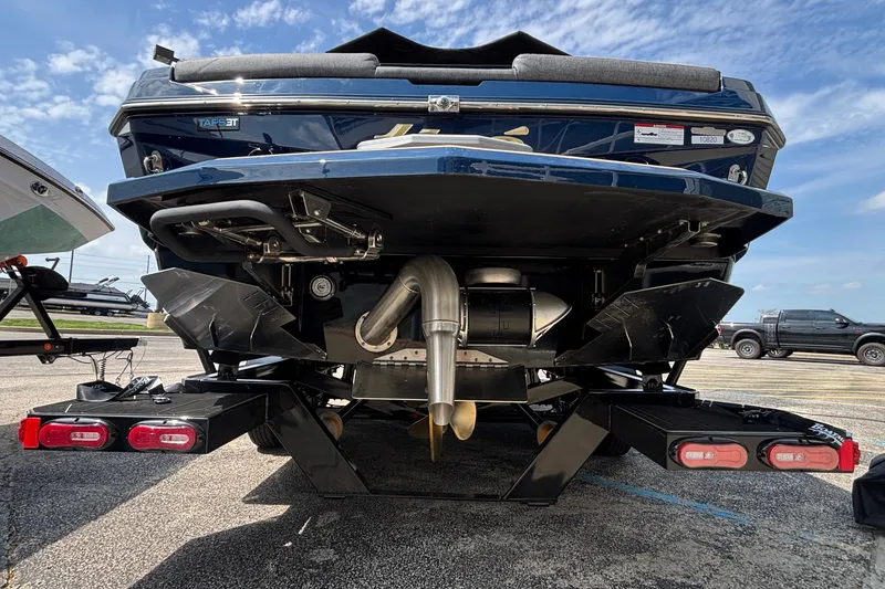 Slide: The Image of 2026 Tigé Z3 boat rear view showcasing propeller and exhaust system. - 6