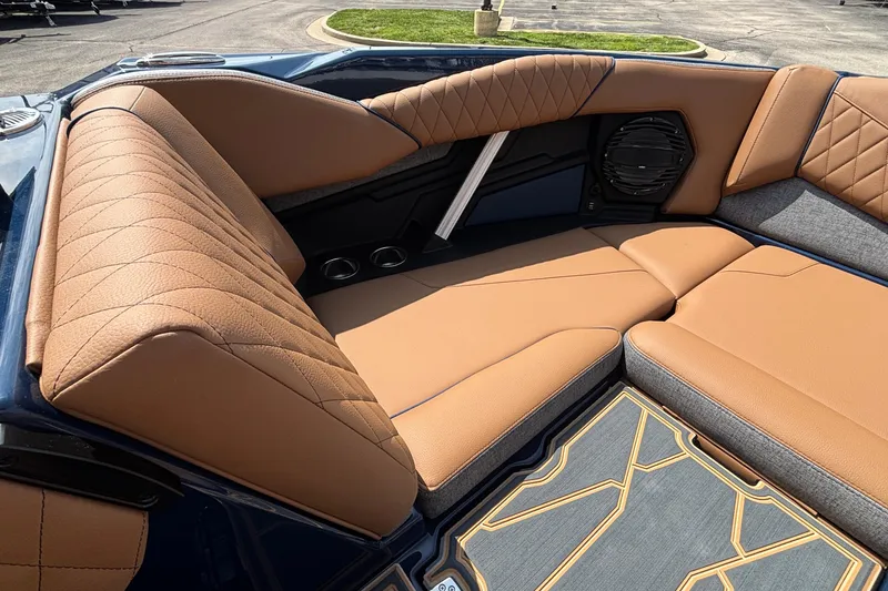 Slide: The Image of Luxurious interior of 2026 Tigé Z3 boat with tan leather seating and stylish design. - 60