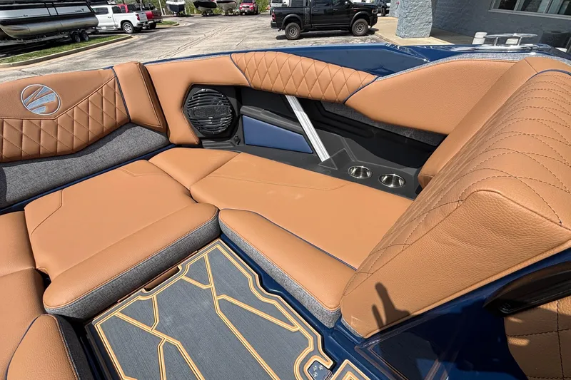 Slide: The Image of Luxurious interior of 2026 Tigé Z3 boat with tan leather seating and modern design. - 62