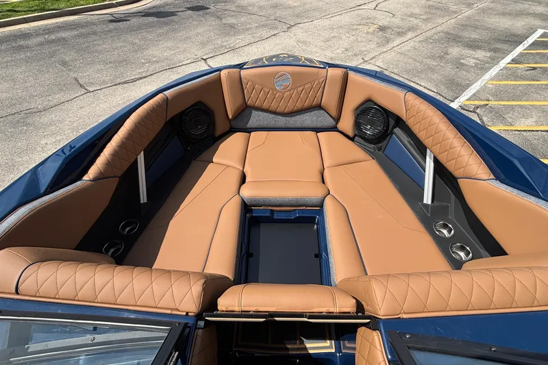 Slide: The Image of Luxurious interior of 2026 Tigé Z3 boat with tan leather seating and modern design. - 63