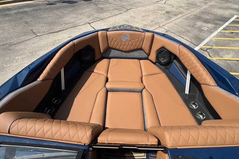 Slide: The Image of Luxurious interior of 2026 Tigé Z3 boat with tan leather seating. - 64