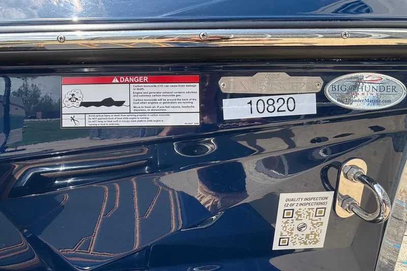 Slide: The Image of 2026 Tigé Z3 boat with safety warning, inspection sticker, and Big Thunder Marine logo. - 7