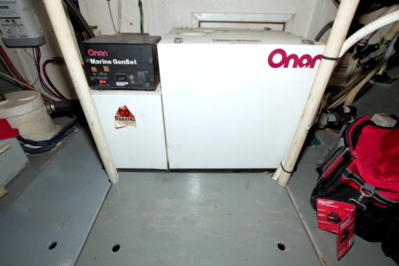 Slide: The Image of Onan Marine GenSet in 1999 Monk 36 Trawler engine room. - 61