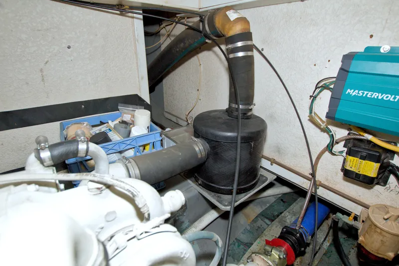 Slide: The Image of Engine room of a 1999 Monk 36 Trawler with Mastervolt equipment and various components. - 69