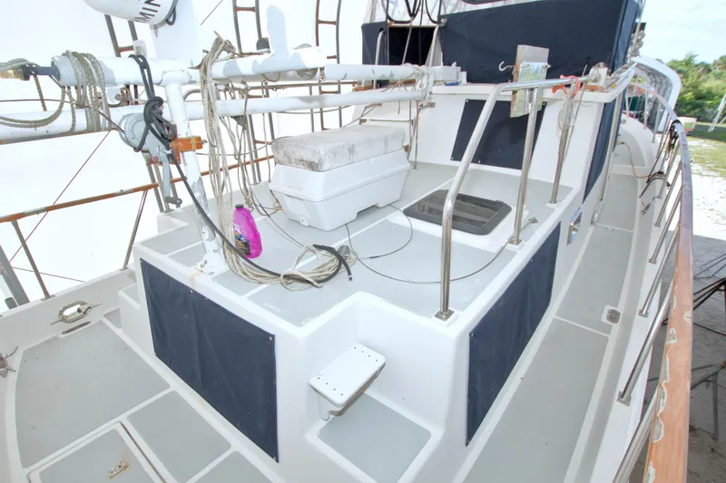 Slide: The Image of 1999 Monk 36 Trawler deck with ropes and equipment, showcasing spacious layout. - 8