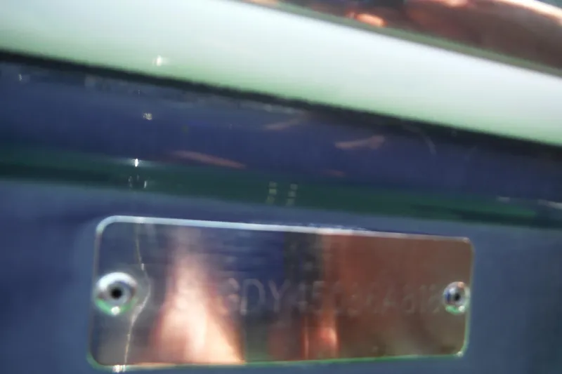 Slide: The Image of 2018 Hurricane SunDeck 2690 OB boat identification plate close-up. - 25