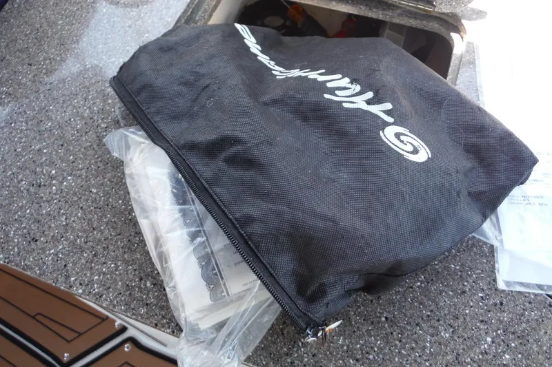 Slide: The Image of Black Hurricane bag on a 2018 SunDeck 2690 OB boat surface. - 29