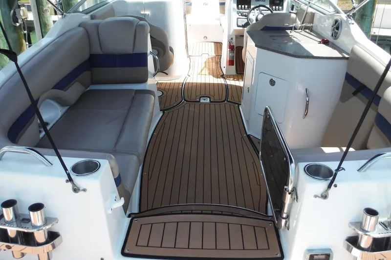 Slide: The Image of 2018 Hurricane SunDeck 2690 OB interior with spacious seating and sleek design. - 6
