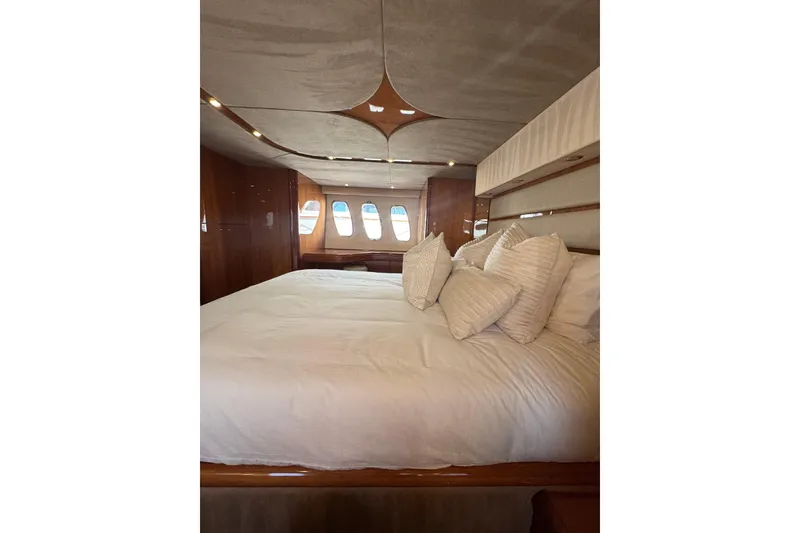 Slide: The Image of Luxurious bedroom interior of 2004 Sunseeker Predator 68 yacht with plush bedding. - 19