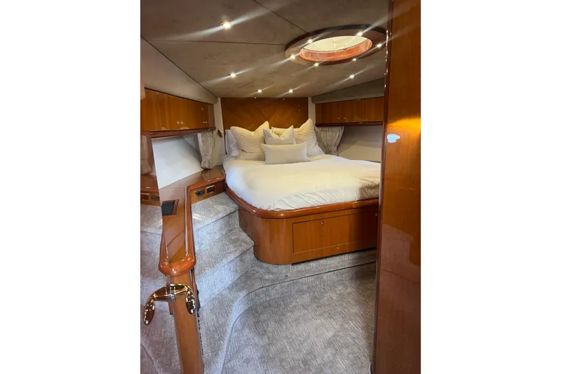 Slide: The Image of Luxurious cabin interior of 2004 Sunseeker Predator 68 yacht with cozy bed. - 4