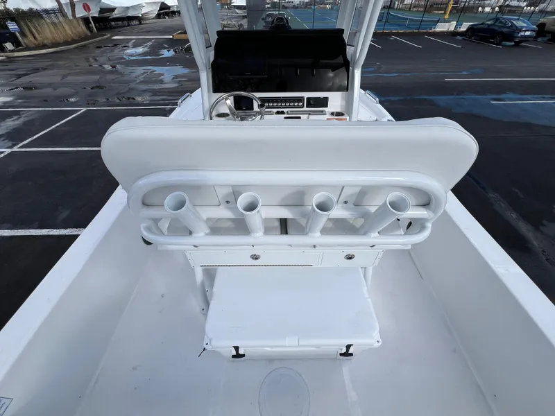 Slide: The Image of 2024 Sea Fox 231 Bay Fox boat interior with rod holders and console. - 21