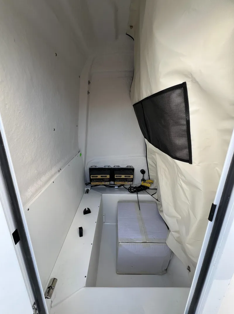 Slide: The Image of Interior cabin of 2024 Sea Fox 231 Bay Fox boat with storage and equipment. - 34