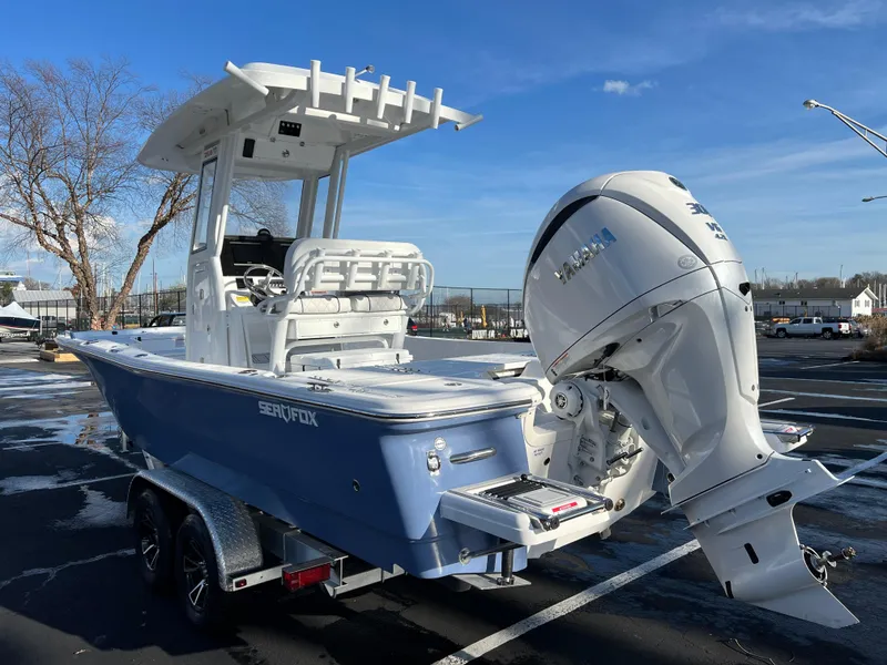 Slide: The Image of 2024 Sea Fox 251 Bay Fox boat with Yamaha outboard engine on trailer. - 3
