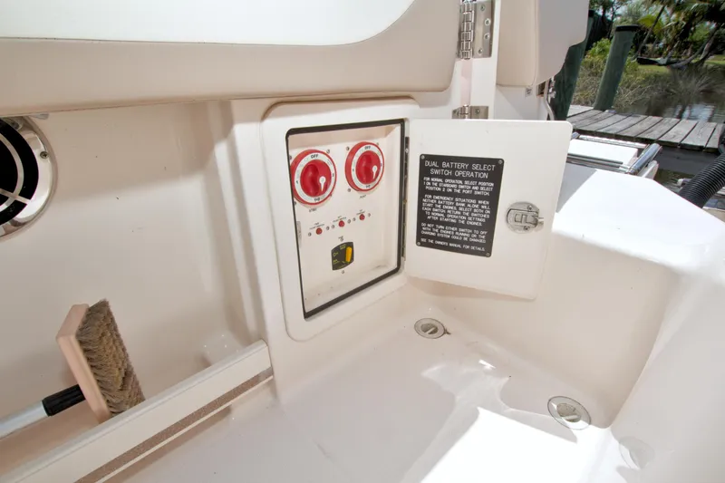 Slide: The Image of Control panel on 2013 Grady-White Freedom 275 boat with dual battery switch. - 12