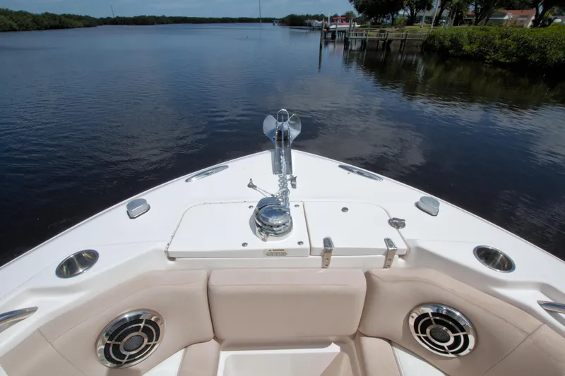 Slide: The Image of Bow view of 2013 Grady-White Freedom 275 boat on calm water. - 32