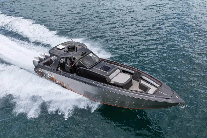 Slide: The Image of 2025 Cigarette 42' Auroris speedboat cruising on open water. - 3