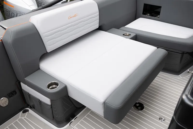 Slide: The Image of Luxury seating on 2025 Cigarette 42' Auroris boat with cup holders and sleek design. - 7