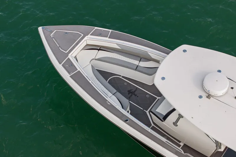Slide: The Image of Aerial view of a 2012 Statement 350 Open boat on green water. - 13