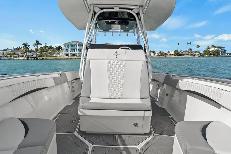 Slide: The Image of Interior view of a 2012 Statement 350 Open boat on the water. - 18