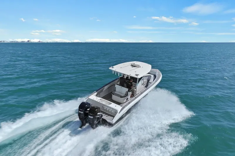Slide: The Image of Statement 350 Open 2012 boat cruising on open sea. - 2