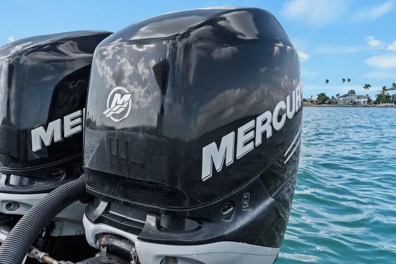 Slide: The Image of Mercury outboard engines on a 2012 Statement 350 Open boat. - 25
