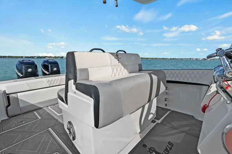 Slide: The Image of Interior view of a 2012 Statement 350 Open boat on the water. - 34