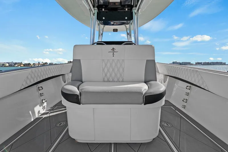 Slide: The Image of Luxurious seating area on a 2012 Statement 350 Open boat. - 36
