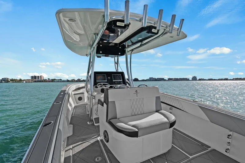 Slide: The Image of Interior view of a 2012 Statement 350 Open boat on the water. - 37