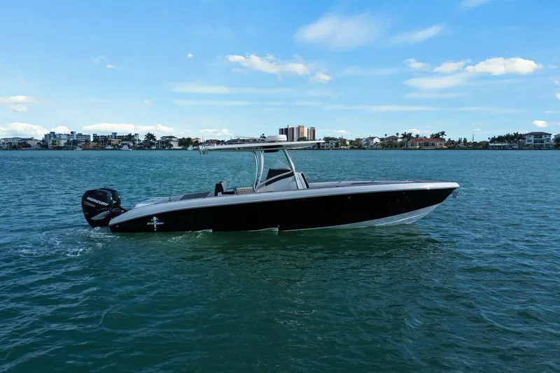 Slide: The Image of 2012 Statement 350 Open boat on calm water. - 7