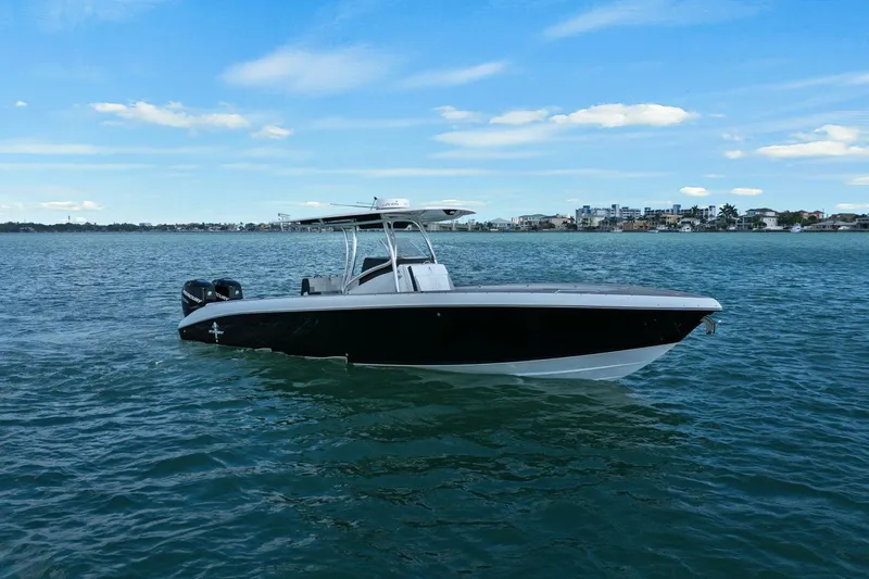 Slide: The Image of 2012 Statement 350 Open boat on calm water. - 8