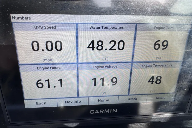 Slide: The Image of Garmin display showing Crownline 265 SS boat metrics: speed, water temperature, engine trim, and more. - 18