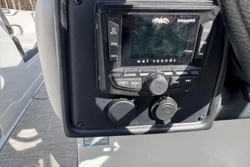 Slide: The Image of 2022 Crownline 265 SS boat audio system with Wet Sounds control panel. - 20