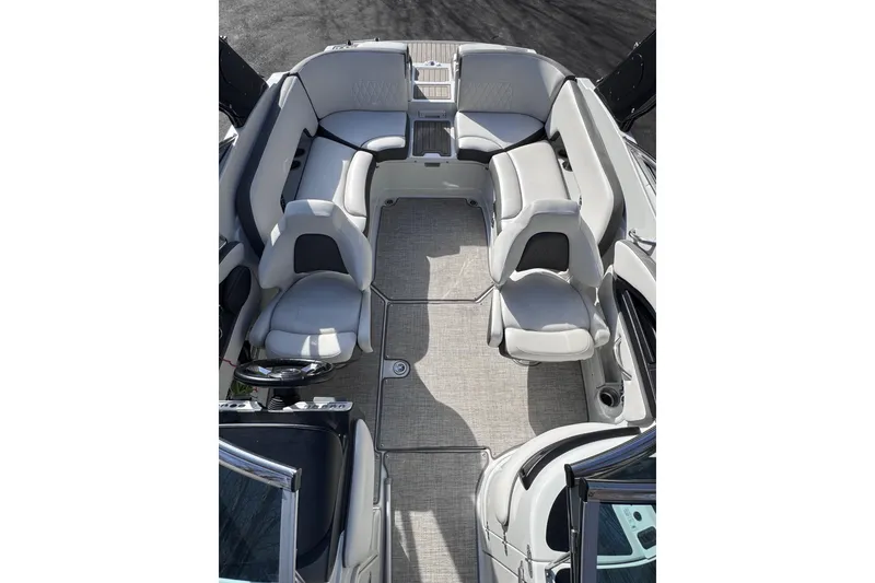 Slide: The Image of 2022 Crownline 265 SS boat interior with luxurious seating and modern design. - 34