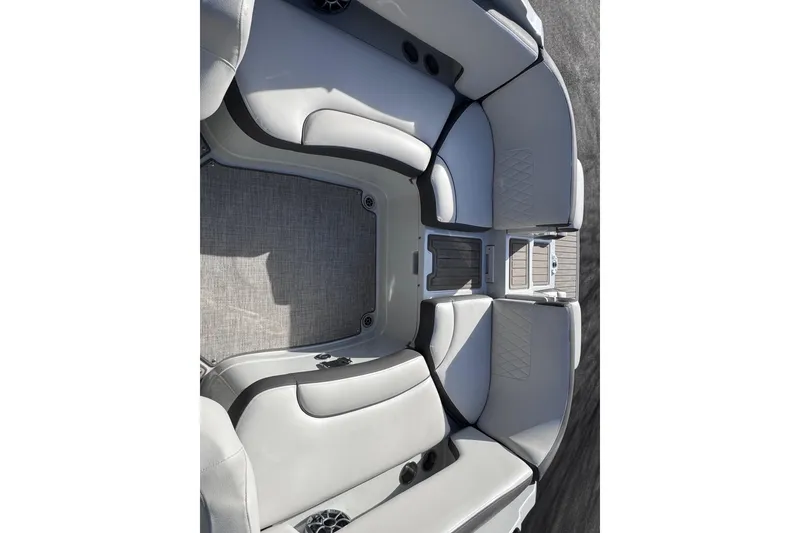 Slide: The Image of 2022 Crownline 265 SS boat interior with luxurious seating and modern design. - 37
