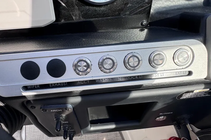 Slide: The Image of Control panel of a 2022 Crownline 265 SS boat with labeled buttons. - 41