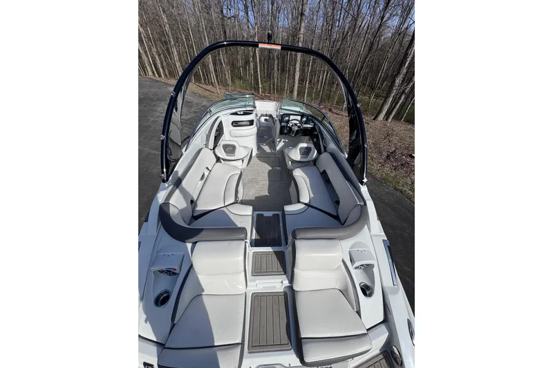 Slide: The Image of 2022 Crownline 265 SS boat interior with spacious seating and sleek design. - 46