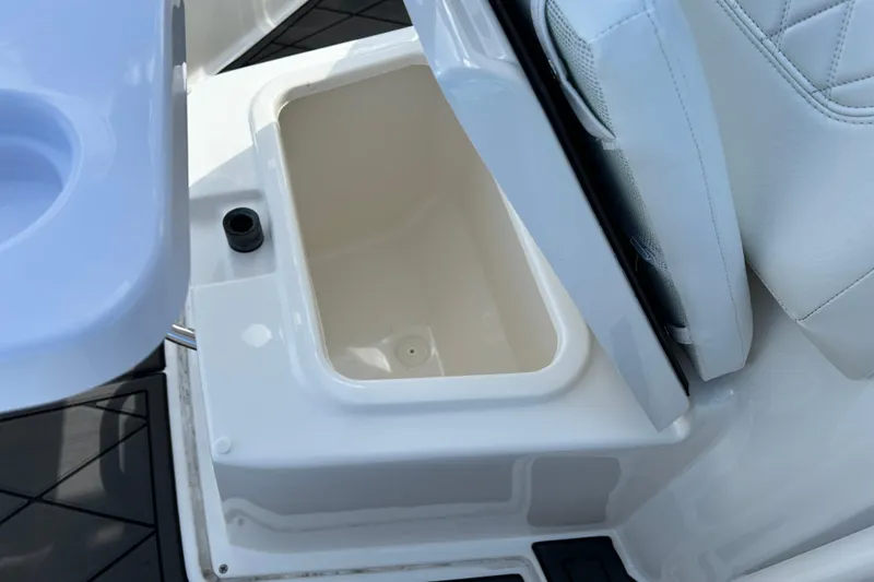 Slide: The Image of 2022 Bayliner Trophy T20CX boat seat with integrated storage compartment. - 15