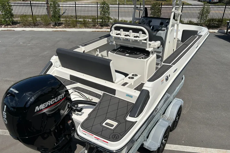 Slide: The Image of 2022 Bayliner Trophy T20CX boat with Mercury 150 engine on trailer. - 7