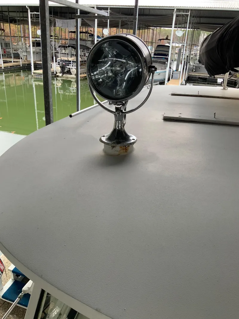 Slide: The Image of Vintage 1969 Hatteras 41 Double Cabin boat spotlight on deck. - 22