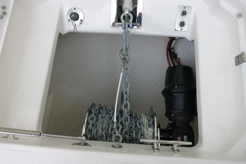 Slide: The Image of Anchor chain compartment of 2025 Robalo R360 Center Console boat. - 11