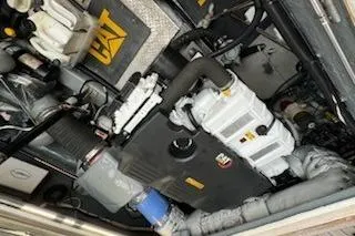 Slide: The Image of Engine room of a 1993 Mikelson 50 Sportfisher with CAT components visible. - 17