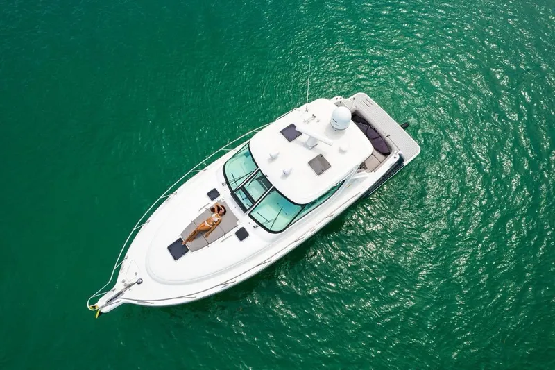 The Image of Aerial view of 2006 Tiara Yachts 4300 Sovran on turquoise water. - 1