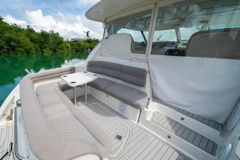 Slide: The Image of Luxurious 2006 Tiara Yachts 4300 Sovran with spacious seating and scenic water view. - 7