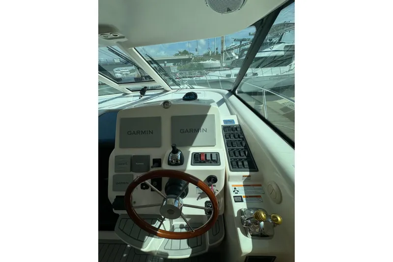 Slide: The Image of Helm of 2006 Tiara Yachts 4300 Sovran with Garmin navigation system. - 9