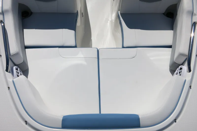 Slide: The Image of 2026 Robalo R207 Dual Console boat interior with cushioned seating and sleek design. - 10