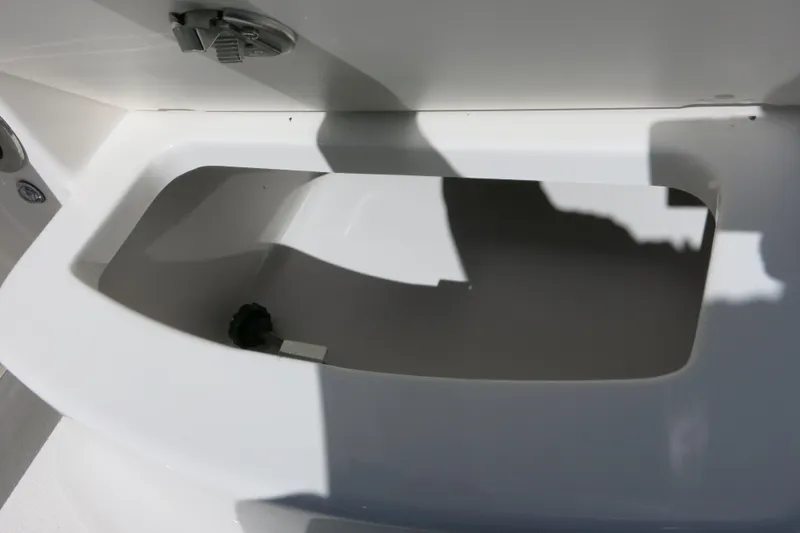 Slide: The Image of Storage compartment in 2026 Robalo R207 Dual Console boat. - 24